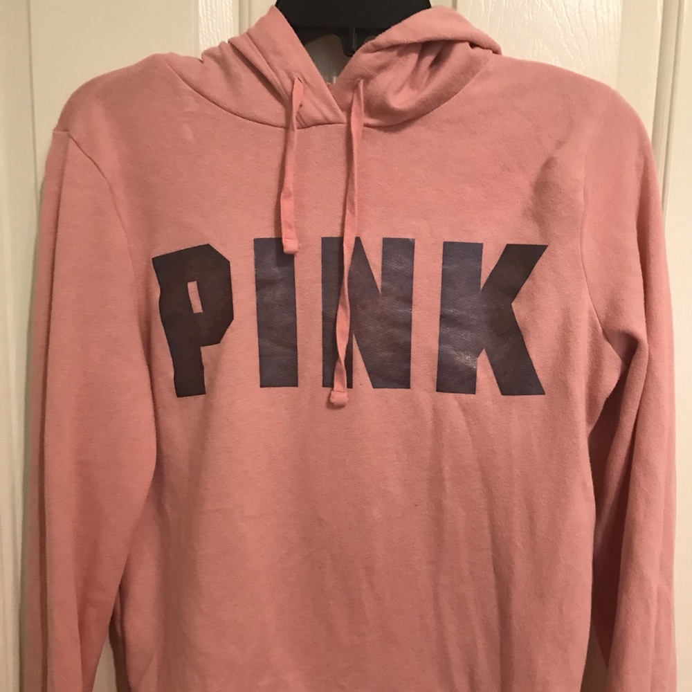 Pink hoodie.